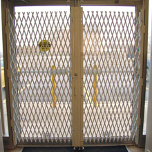 scissor gate entry door with lock