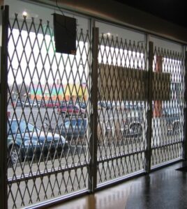 large security gate securing store windows