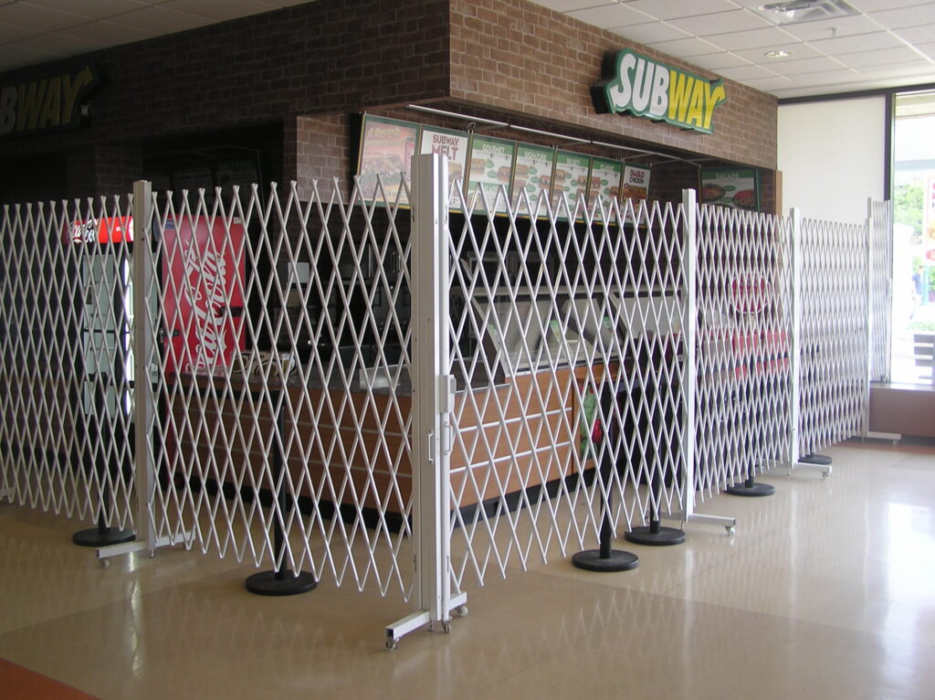 Portable security gate guarding a restaurant