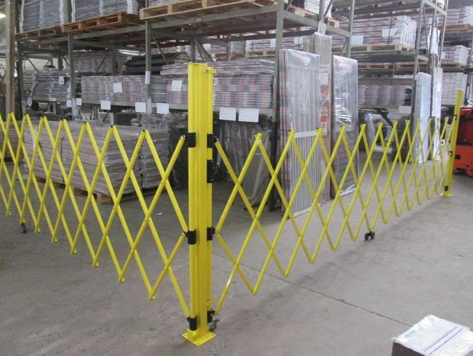 fixed mounted yellow portable barricade