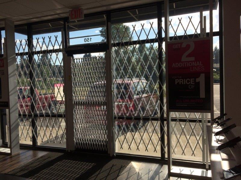 game store window security gates