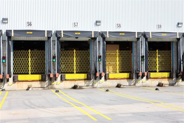 Safety gates for dock doors